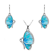 Blue enamel butterfly necklace and earrings set with silver and rhinestones