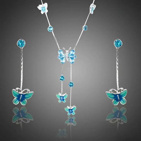 Silver butterfly necklace and earrings set with turquoise enamel and crystals