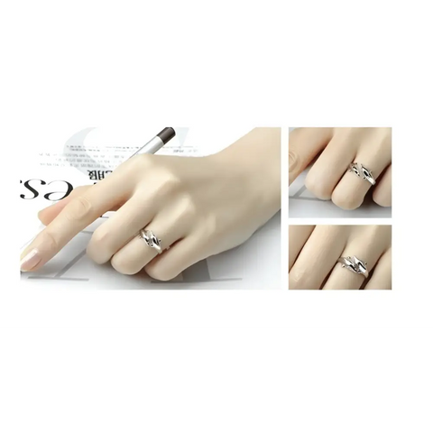 Silver Dolphin Ring with intertwined bird-wing design, symbol of protection