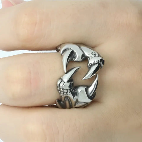 Dragon Ring with interlocking skulls symbol of strength and protection