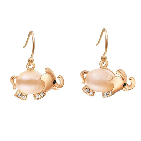 Rose gold elephant earrings with peach pearl body, clear gem feet, good luck symbol