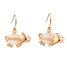 Rose gold elephant earrings with peach pearl body, clear gem feet, good luck symbol