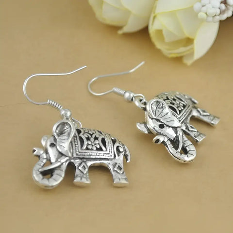 Silver elephant dangle earrings with engraved patterns, vintage finish