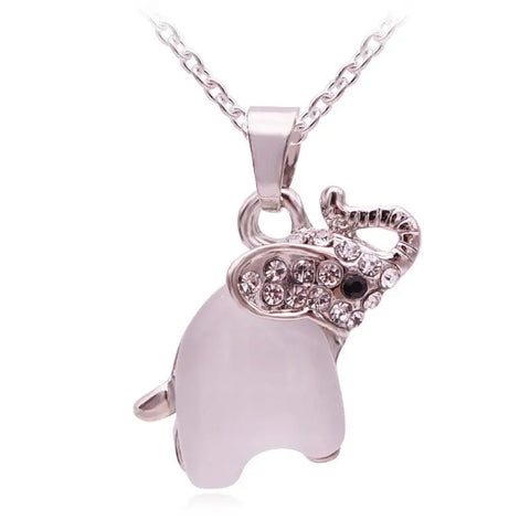Silver rose gold elephant pendant necklace with translucent white body, rhinestone head, black eye