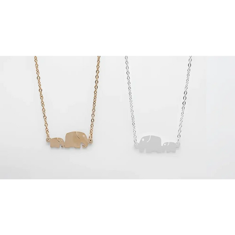 Two elephant necklaces in rose gold and silver with minimalist adult baby design symbolizing protection