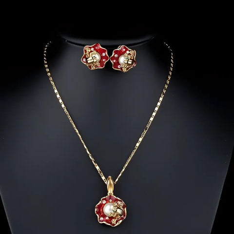 Red and gold Frog earrings and pendant set with sparkling floral designs