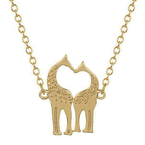 Gold giraffe heart necklace with dotted texture - love and wildlife symbol