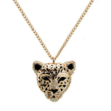 Gold-toned leopard head pendant necklace with rhinestones, enamel accents, symbol of strength