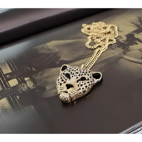 Gold leopard head pendant with black gold details on chain, Leopard Necklace symbol of strength