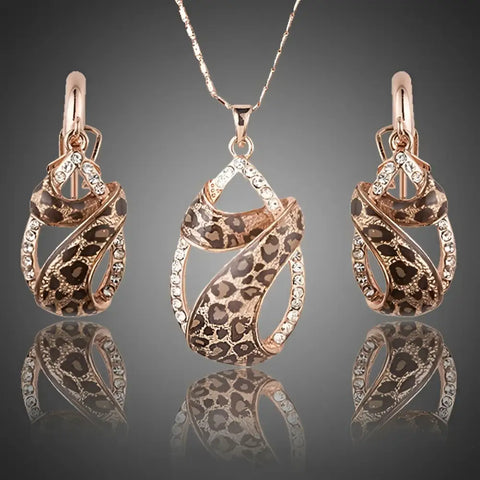 Rose gold leopard print pendant necklace and earrings set with crystal accents