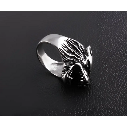 Silver wolf head ring with detailed fur, sharp teeth, symbol of strength
