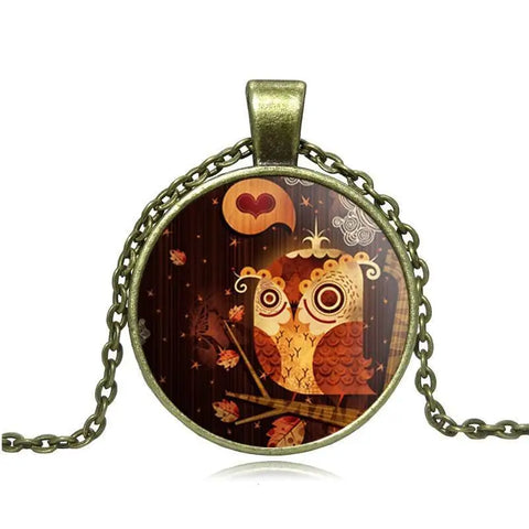 Bronze owl necklace pendant with starry background, symbol of wisdom