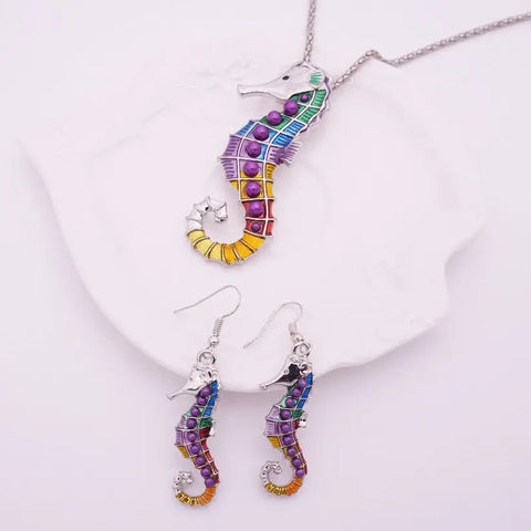 Rainbow seahorse pendant necklace with purple beads on silver chain from Seahorse Set