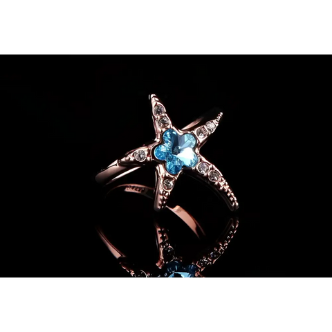 Rose gold starfish ring with blue crystal center, clear crystals, ocean beauty set