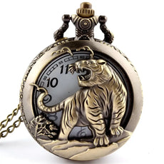Antique brass tiger pocket watch with ornate chain, symbol of strength