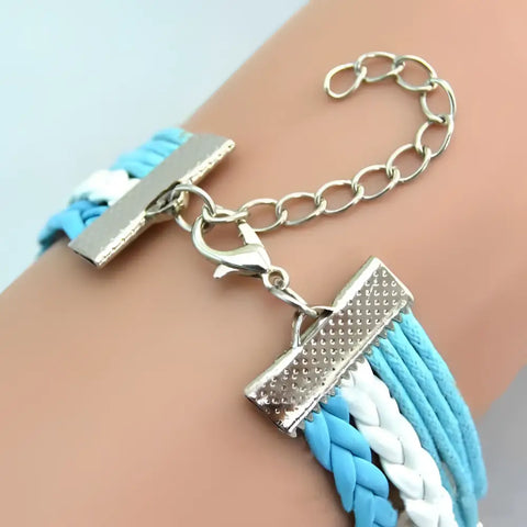 Silver toggle clasp on Turtle Bracelet Set with blue white braided cords