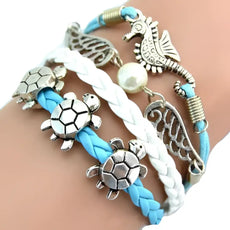 Turtle Bracelet Set with silver turtle, seahorse, wing charms on blue white cords