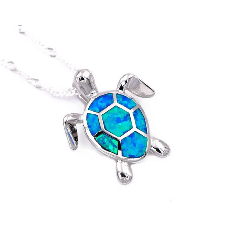 Silver turtle necklace with blue-green opal shell, symbol of protection