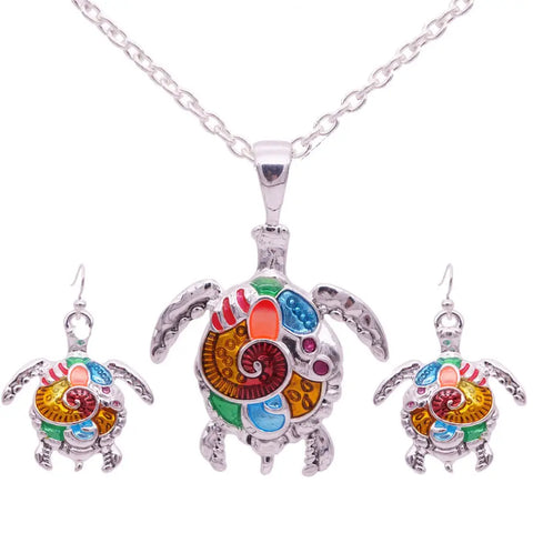 Silver turtle pendant necklace with colorful enamel and gemstone details