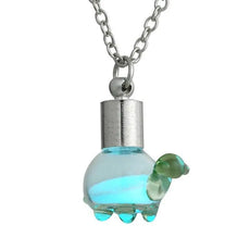Turtle pendant with glowing blue liquid, symbol of protection by Helping Animals At Risk