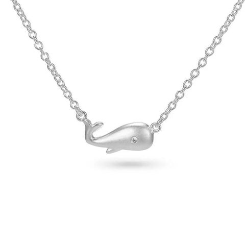 Silver whale pendant necklace with diamond eye for ocean conservation