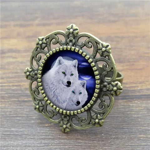 Antique brass filigree Wolf Ring with wolves glass inset