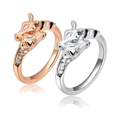 Two zebra-themed rings in rose gold and silver with black stripes, rhinestones, symbol of wildlife by Helping Animals At Risk
