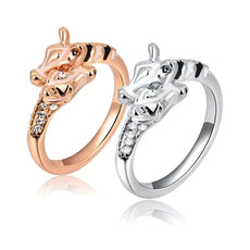 Two zebra-themed rings in rose gold and silver with black stripes, rhinestones, symbol of wildlife by Helping Animals At Risk